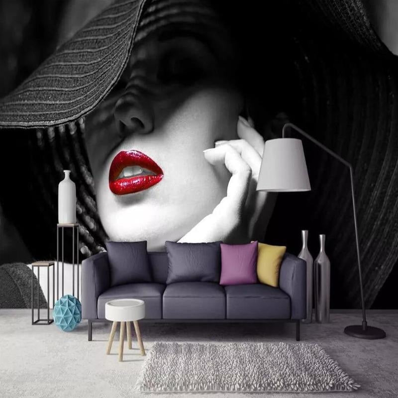Fashion wallpaper with red lips creating dramatic impact in modern living room with minimal furniture