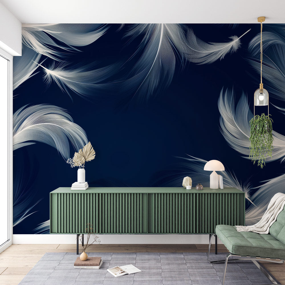 Navy and white feather wallpaper creating a peaceful atmosphere in a modern bedroom with minimal furniture