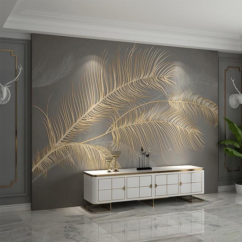 Metallic botanical wallpaper in powder room with gold fixtures