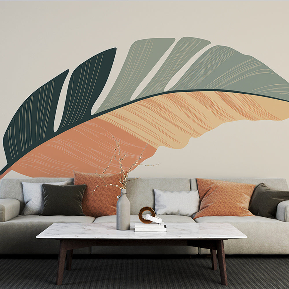 Modern feather wallpaper in terracotta and green tones creating a calm atmosphere in a minimalist living room