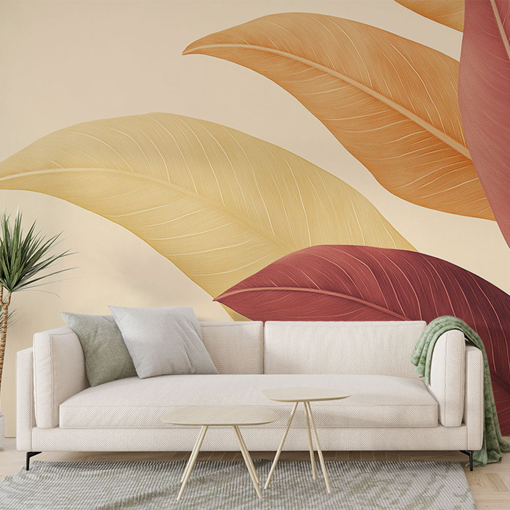 Tropical leaf wallpaper in terracotta and gold tones creating a warm atmosphere in a modern living room setting