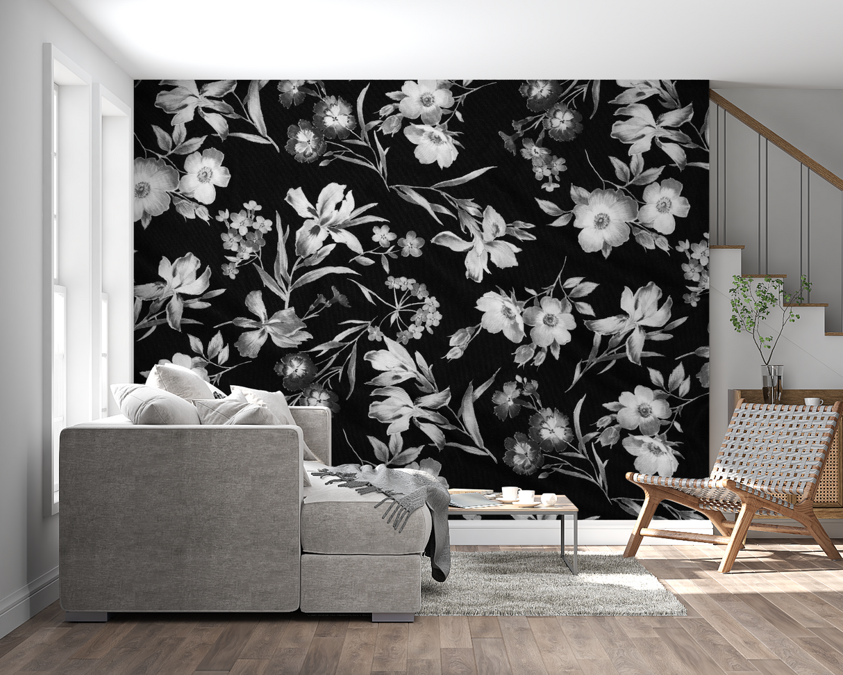 Dramatic black and white botanical wallpaper in hallway with modern furniture
