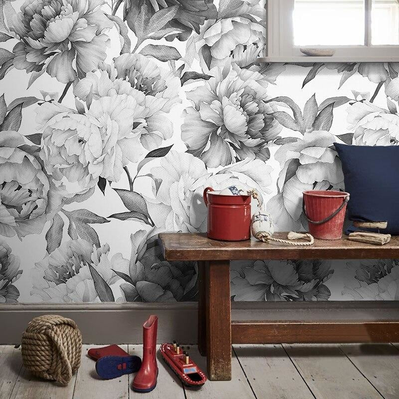 Black and white floral wallpaper showcased in dining room with contemporary decor