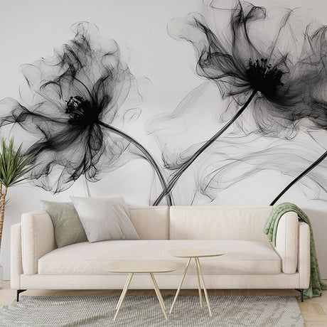 Black and white smoke floral wallpaper creating depth in a modern living room with minimal furniture