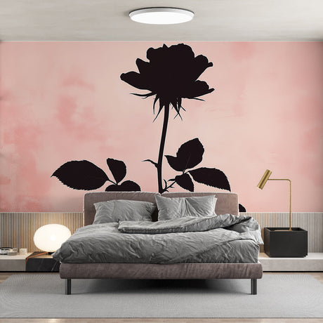 Black Rose Silhouette Wallpaper creating a stunning accent wall in a modern bedroom with pink and gray decor