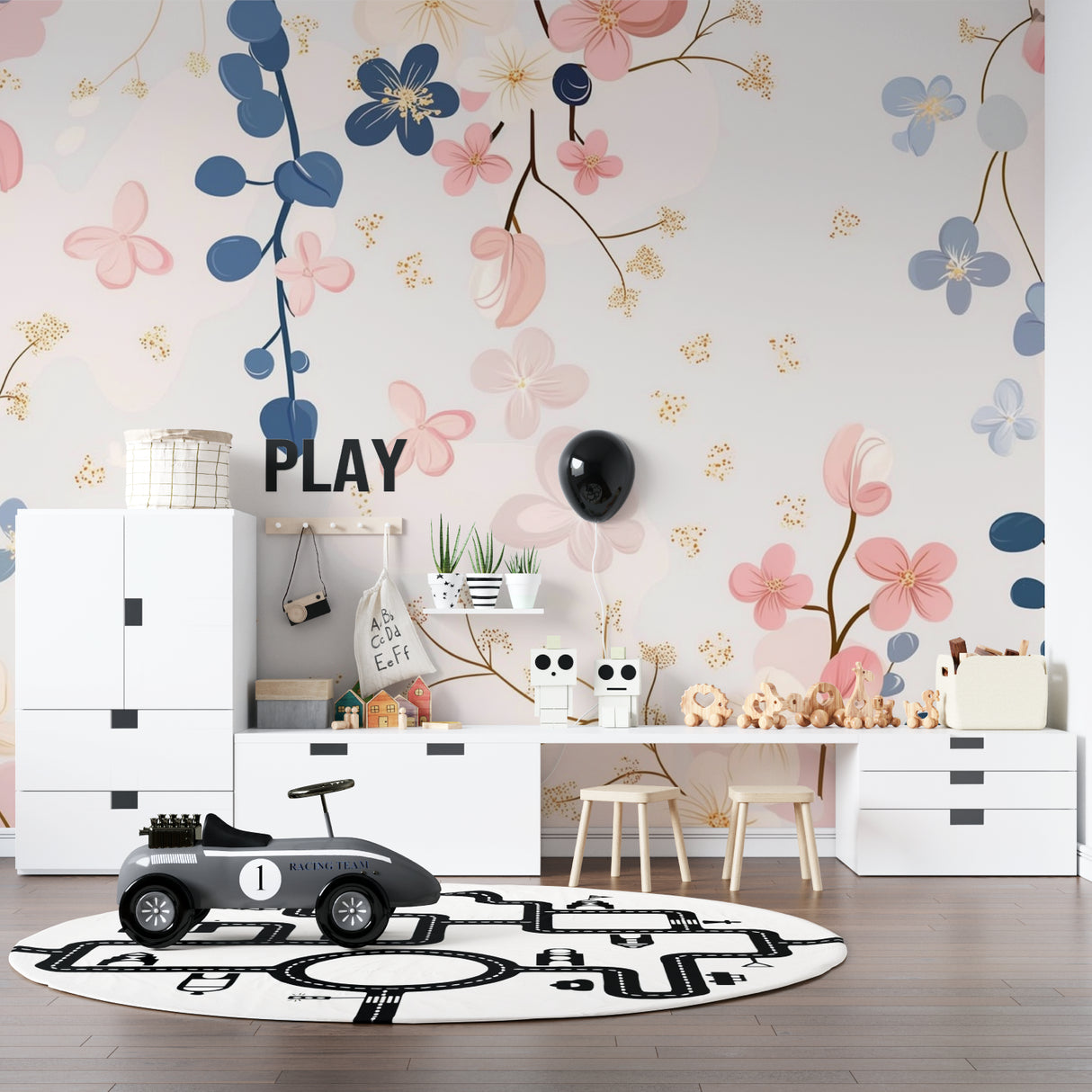 Nursery room showcasing soft pink and navy floral mural wallpaper with subtle golden highlights