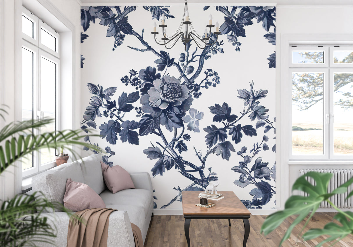 Blue Toile de Jouy wallpaper in an elegant dining room with white wainscoting and crystal chandelier