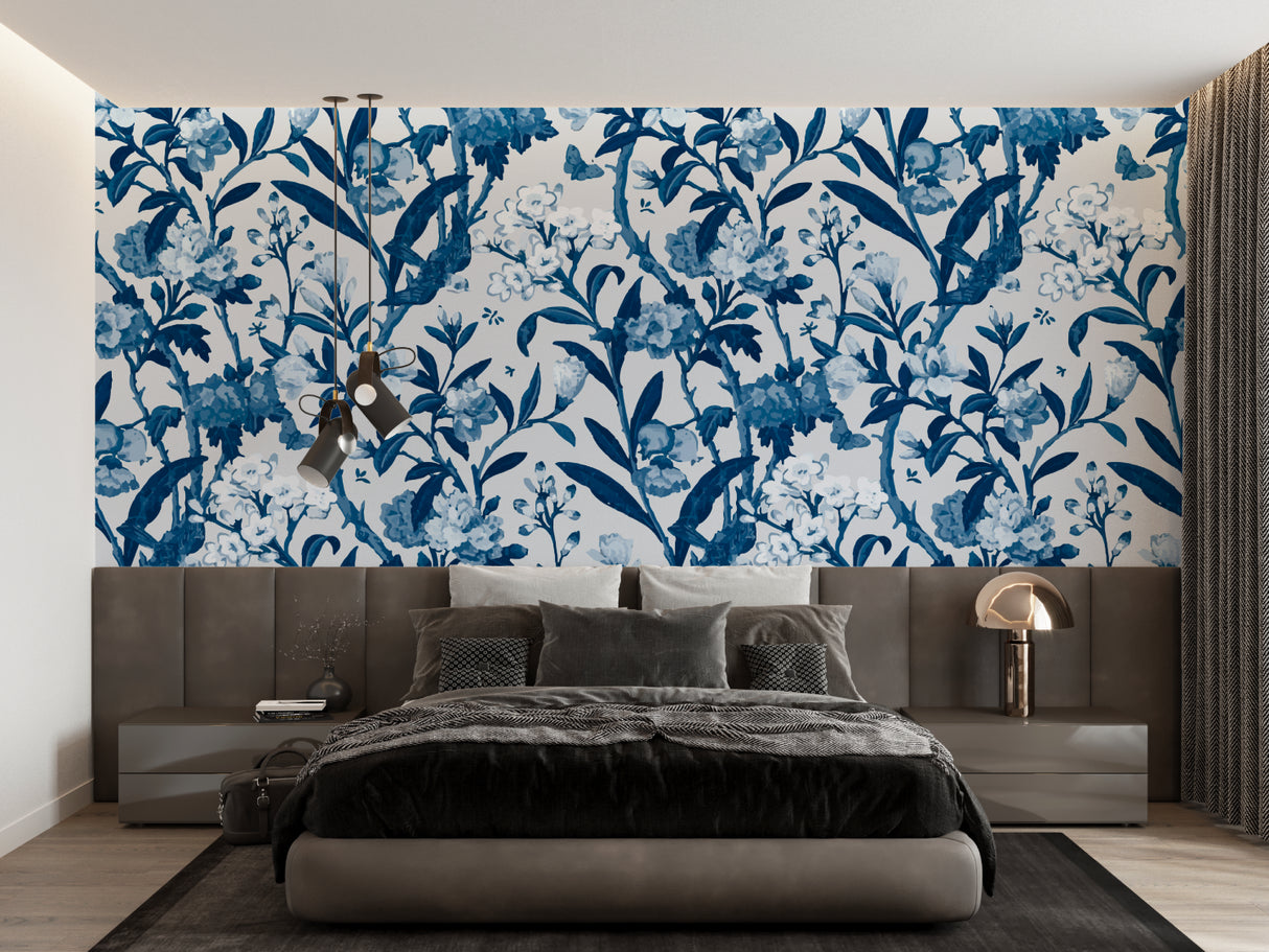 Home office with indigo floral wall mural creating a focused, peaceful workspace