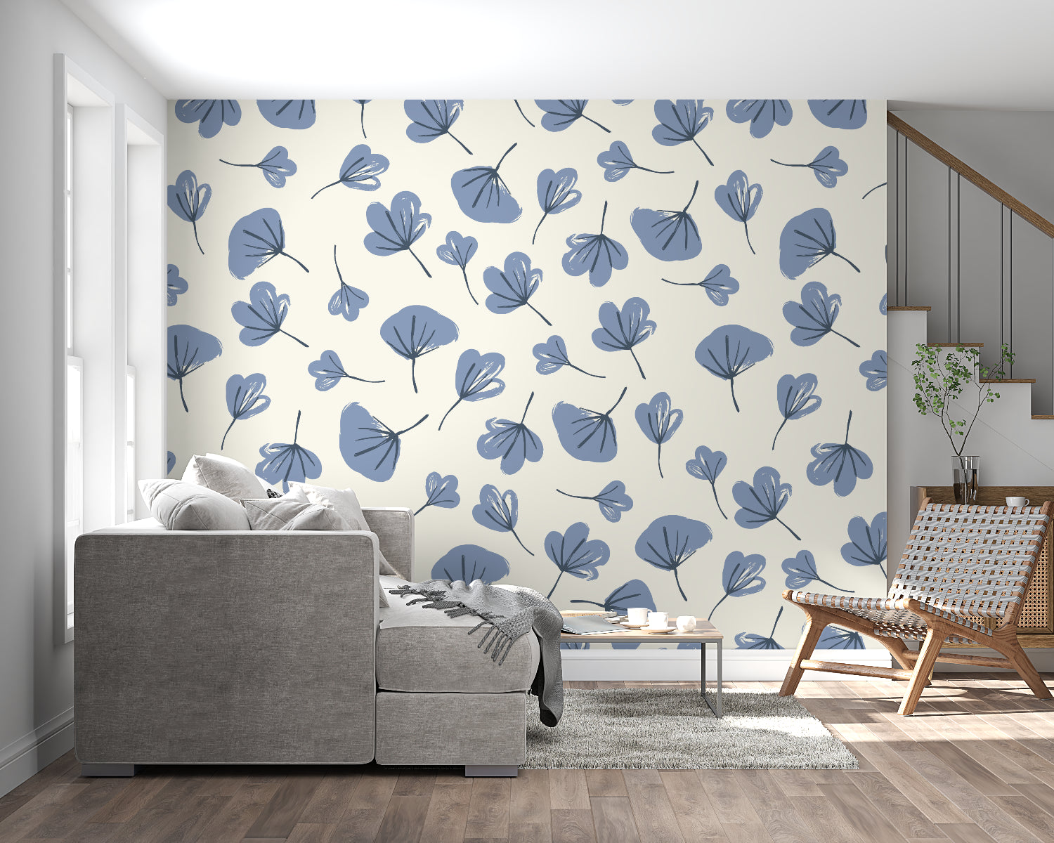 Blue and beige leaf pattern mural in an entrance hallway
