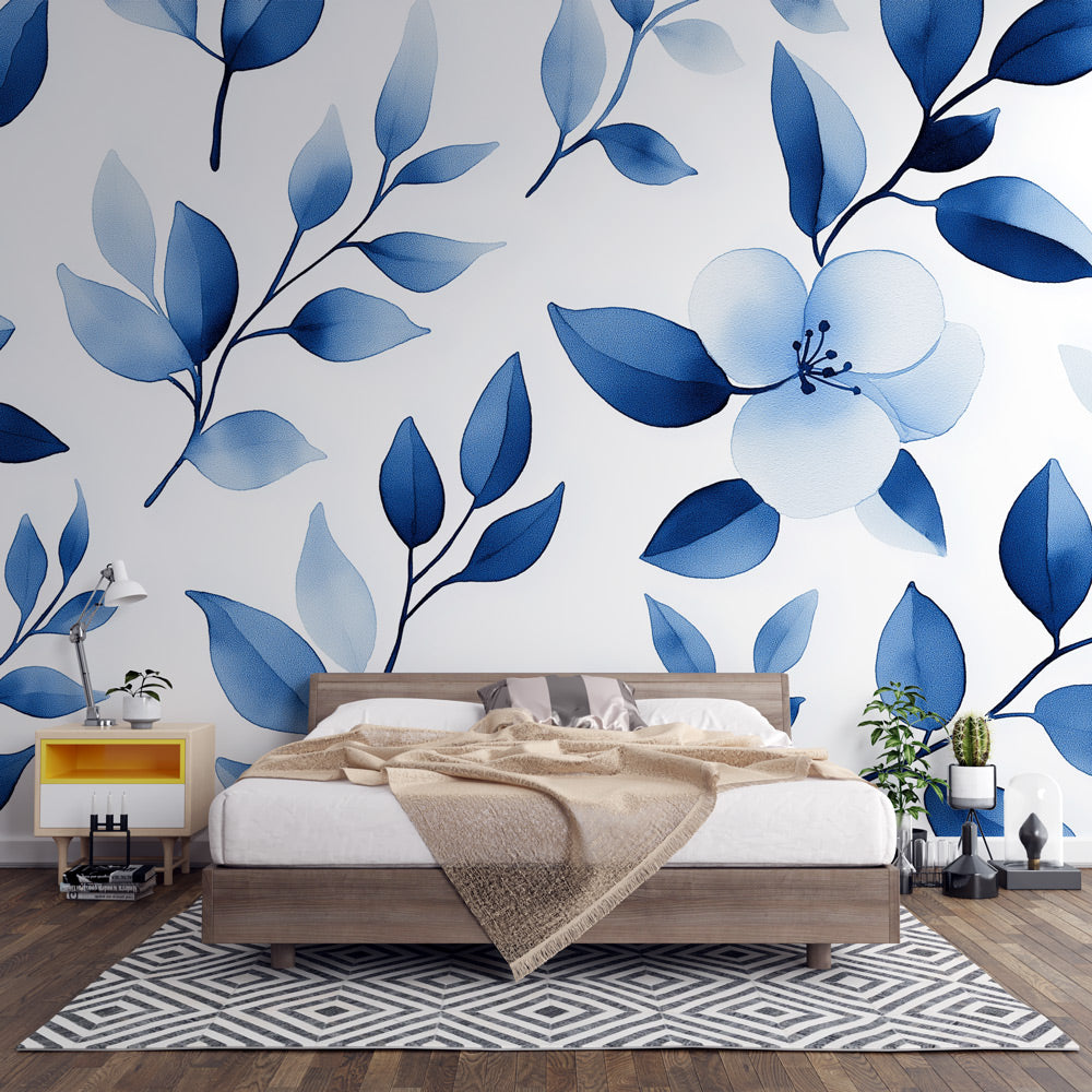 Blue watercolor floral wallpaper creating a serene atmosphere in a modern living room with natural light