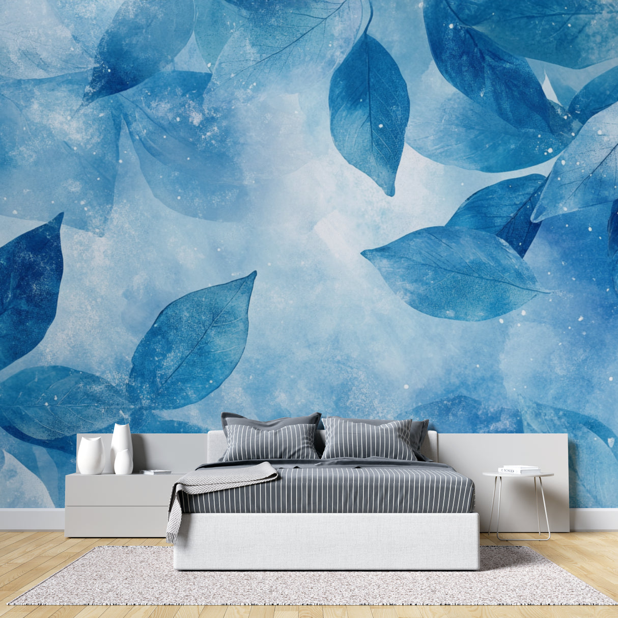 Watercolor blue leaf mural bringing fresh energy to a bright bedroom space