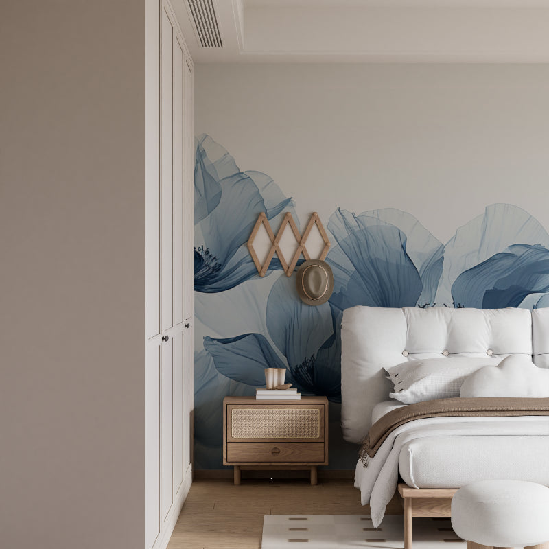 Blue watercolor poppy wallpaper in a bright modern living room creating a serene atmosphere