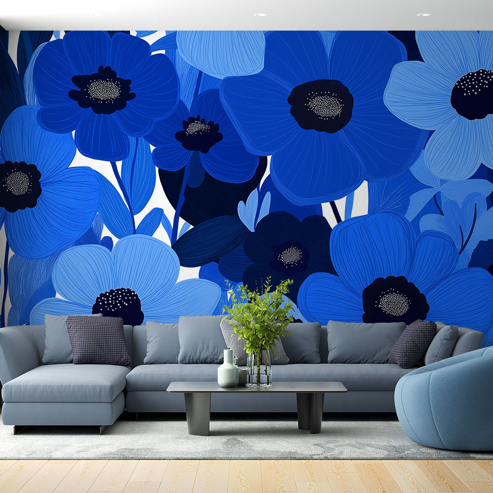 Blue floral wallpaper creating a stunning accent wall in a bright modern living room with white furniture