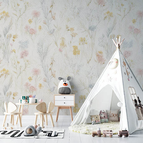 Floral nursery wallpaper with pastel wildflowers creating a peaceful atmosphere in a baby girl's room