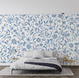 Blue and white floral pattern wallpaper creating a fresh look in a bright modern living room setting