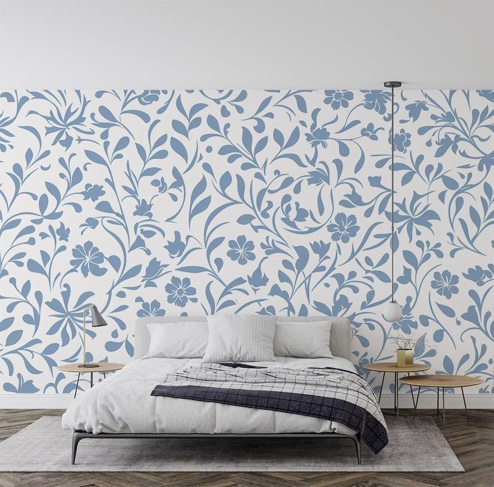Blue and white floral pattern wallpaper creating a fresh look in a bright modern living room setting