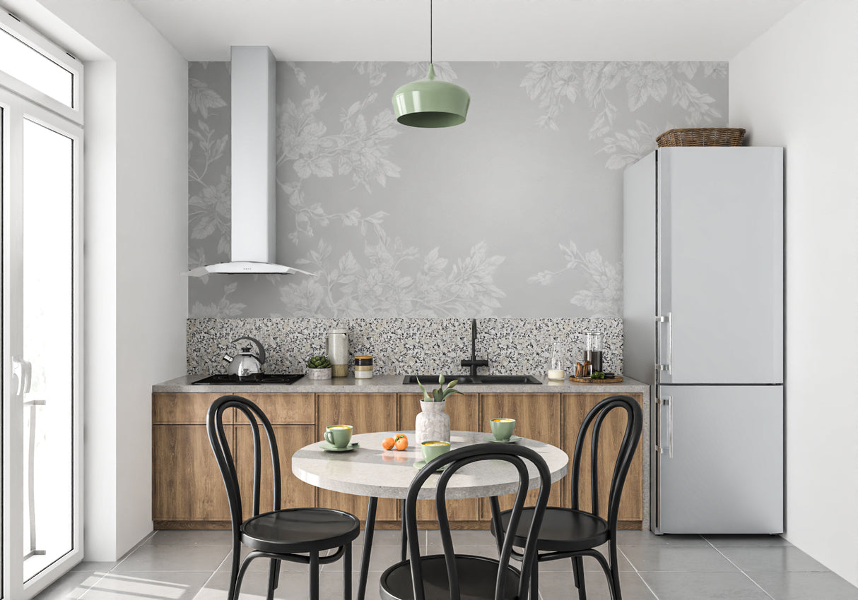 Leaf pattern wallpaper bringing natural elements to an entrance hallway