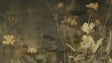 Floral wall mural with golden botanicals brightening a modern living room with green accents