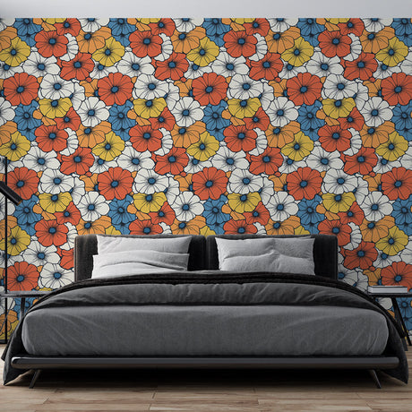 Retro floral wallpaper with coral and blue blooms bringing charm to a bright living room with modern furniture