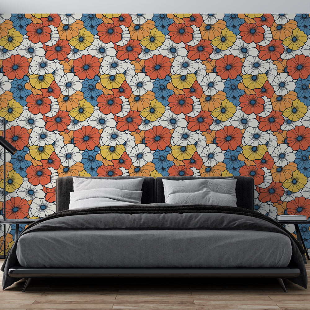 Retro floral wallpaper with coral and blue blooms bringing charm to a bright living room with modern furniture