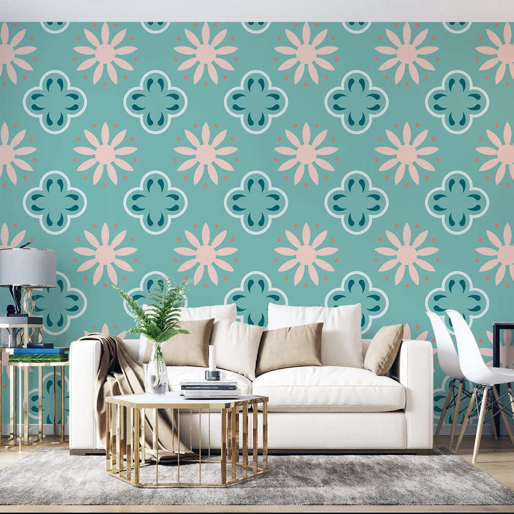 Turquoise geometric floral wallpaper creating a bright, modern feel in a sunny living room with mid-century furniture