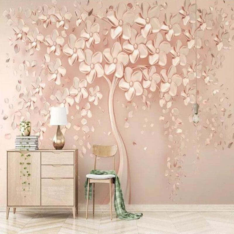 Rose gold tree wallpaper creating a luxurious accent wall in a modern bedroom with soft pink and gold decor elements