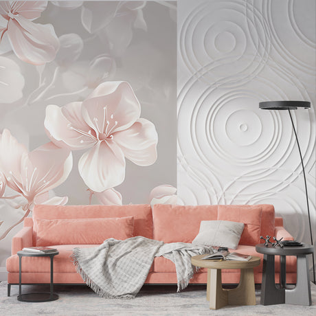 Cherry blossom wallpaper in modern living room showing pink flowers and geometric waves against grey sofa