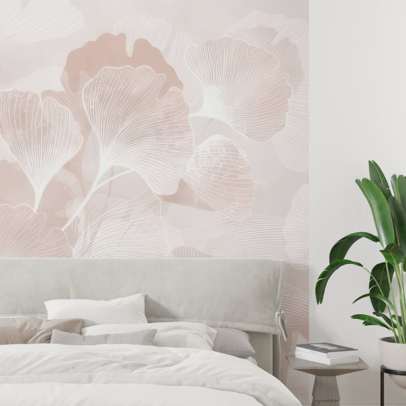 Botanical wall mural with pink Ginkgo leaves in cozy living room setting