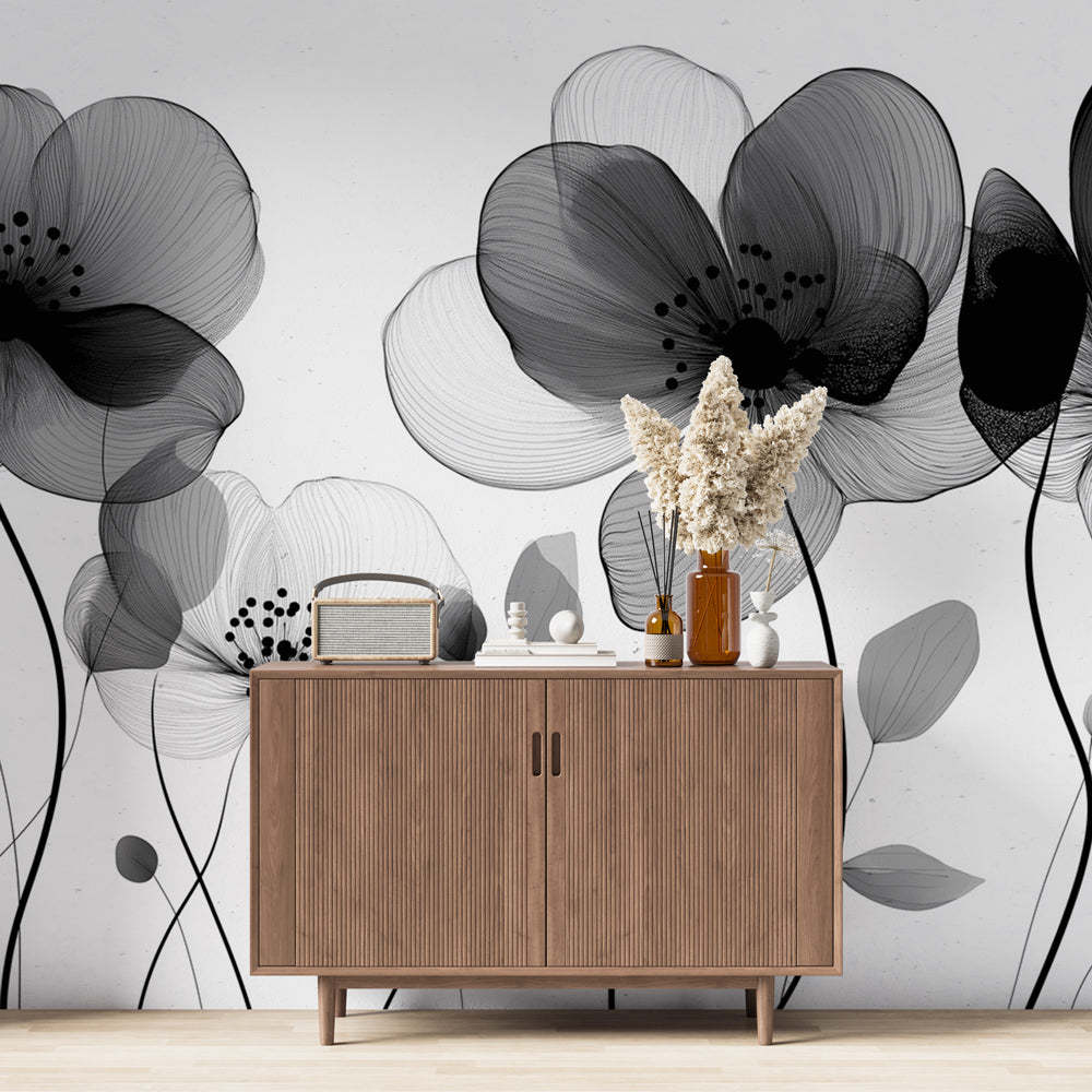 Modern black and white floral wallpaper creating a peaceful atmosphere in a minimalist bedroom with natural light