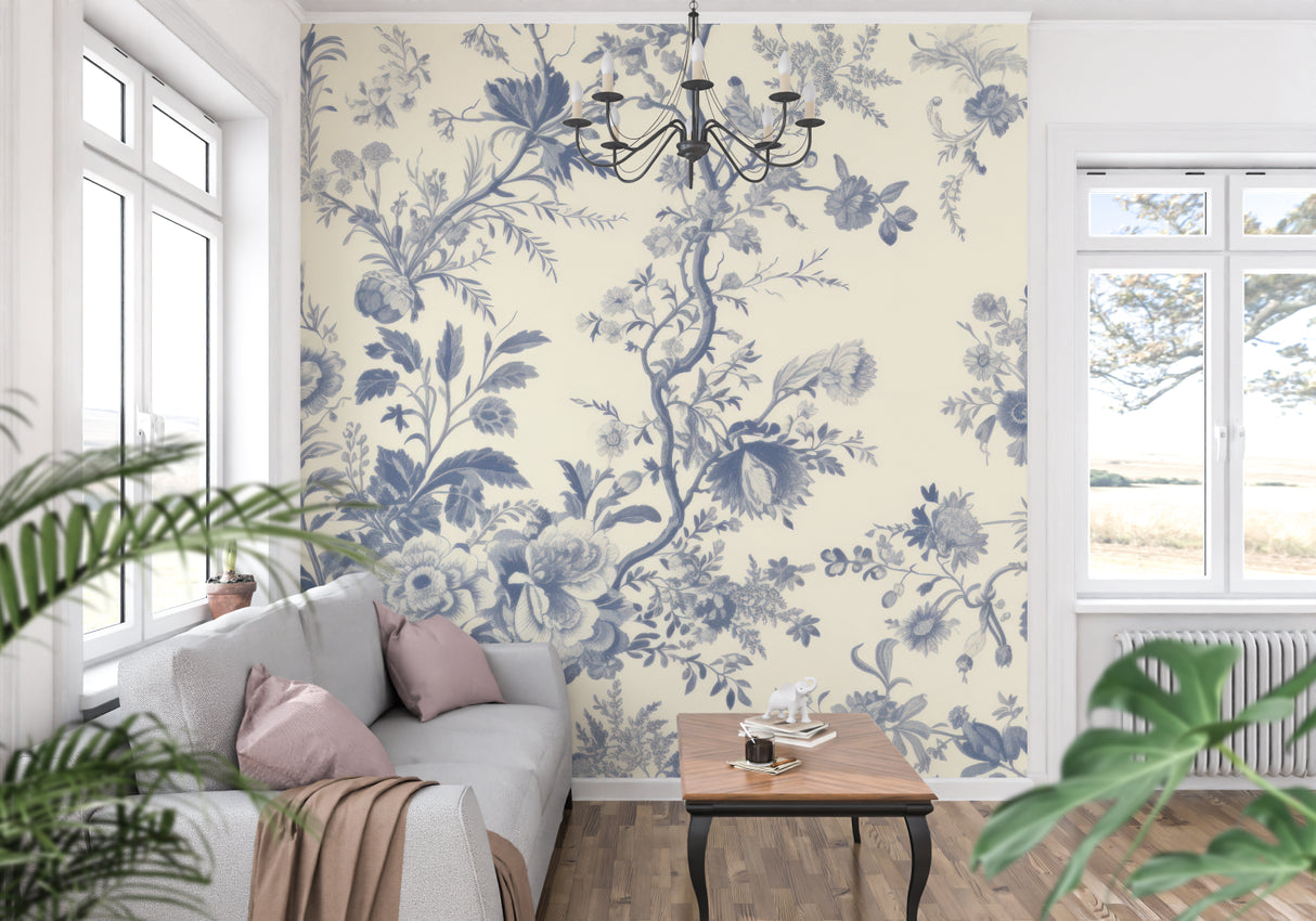 Vintage blue floral wallpaper adding French charm to a cozy bedroom setting