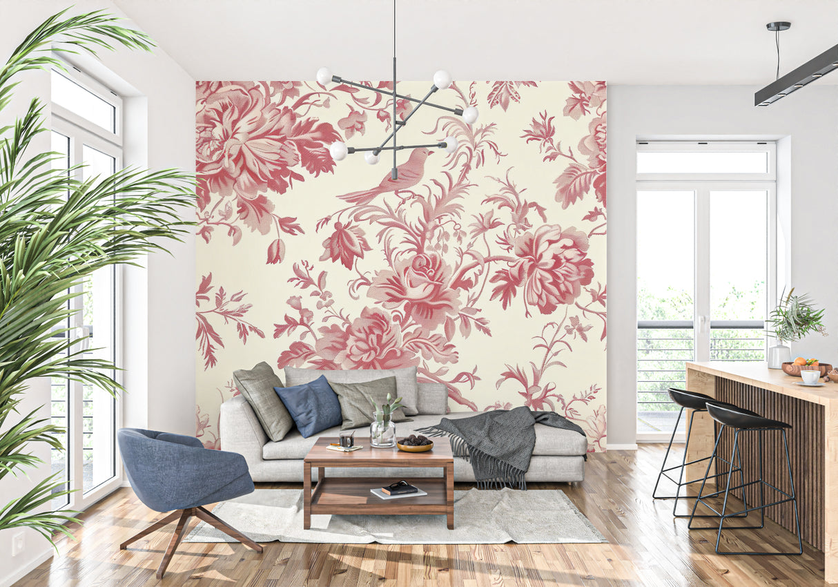 French country living room featuring red floral toile wallpaper with antique furniture