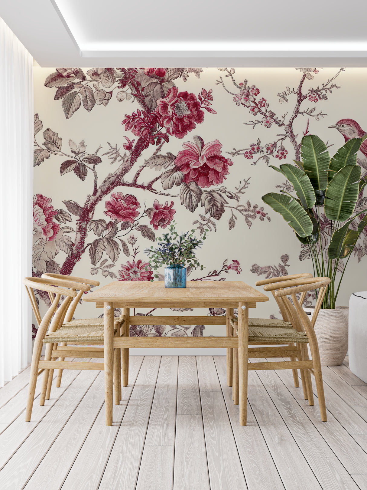 Classic floral wallpaper brightening a cozy bedroom with pink and cream accents