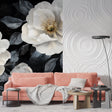 White floral wallpaper mural in modern living room with grey sofa and natural light