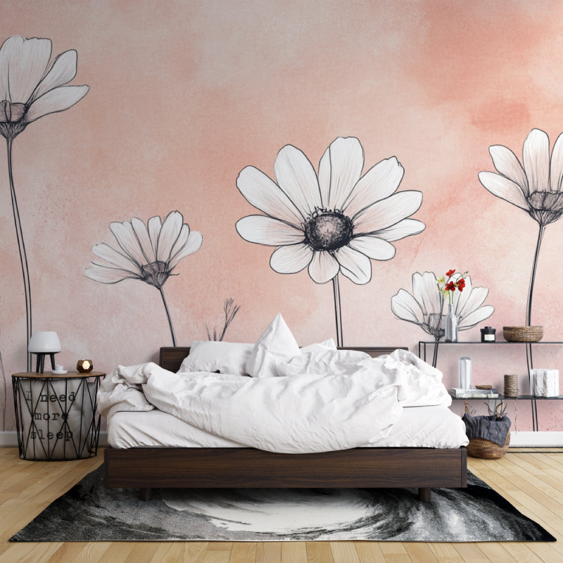Pink and white daisy wallpaper creating a soft accent wall in a nursery