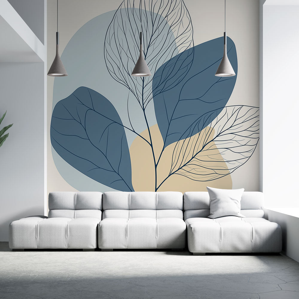 Modern leaf wallpaper with blue and beige pattern shown in a bright Scandinavian living room setting