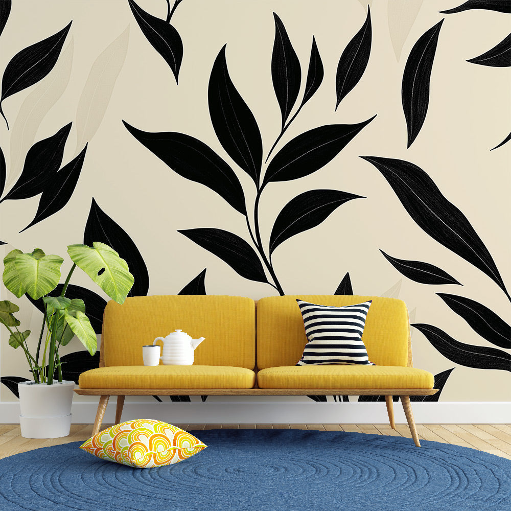 Black and beige botanical wallpaper creating dramatic contrast in a modern living room with natural light
