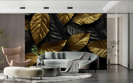 Black and gold foliage wallpaper creating drama in a modern living room setting
