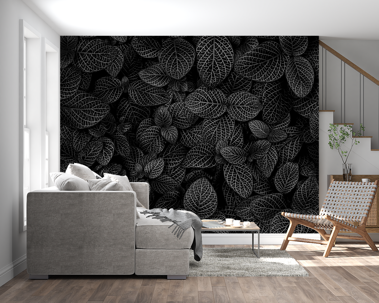 Master bedroom with dramatic black leaf wallpaper accent wall