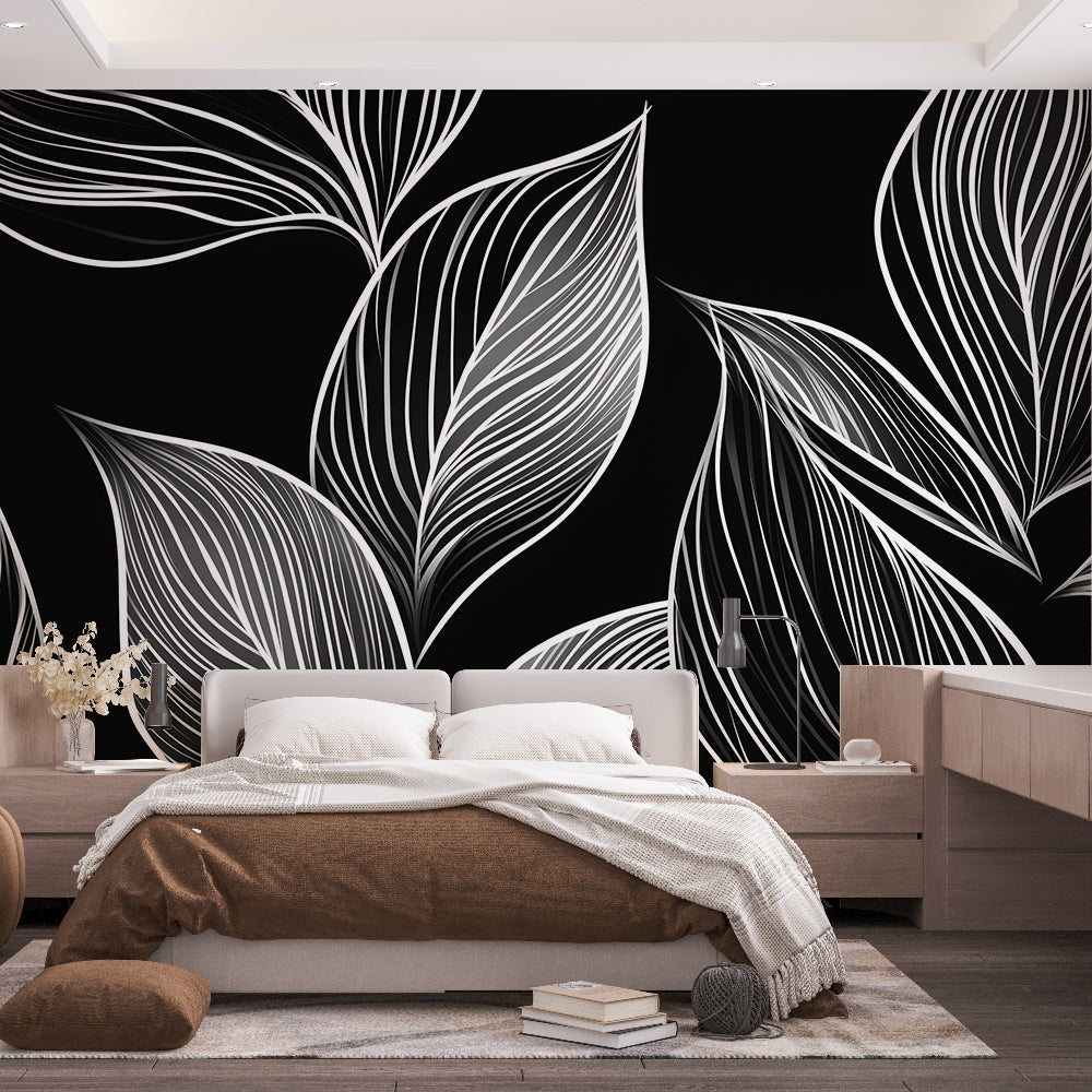 Black and white botanical line art wallpaper creating a striking focal point in a modern living room with natural light
