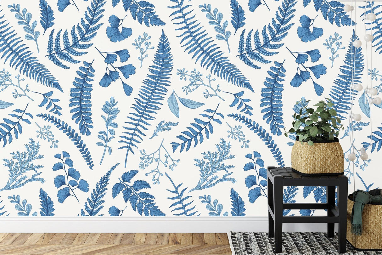 Botanical wall mural with blue ferns featured in a minimalist bedroom setting