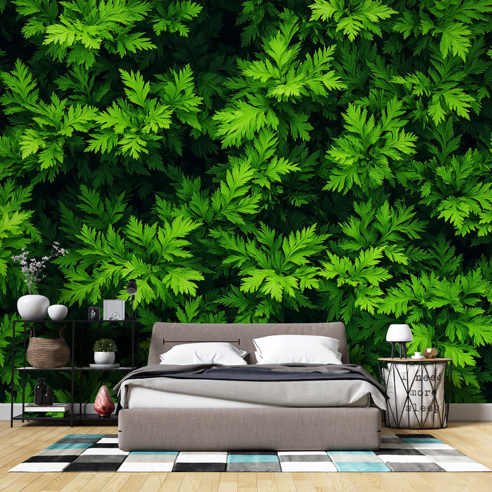Tropical leaf wallpaper creating a fresh green backdrop in a modern living room with natural light and minimal furniture