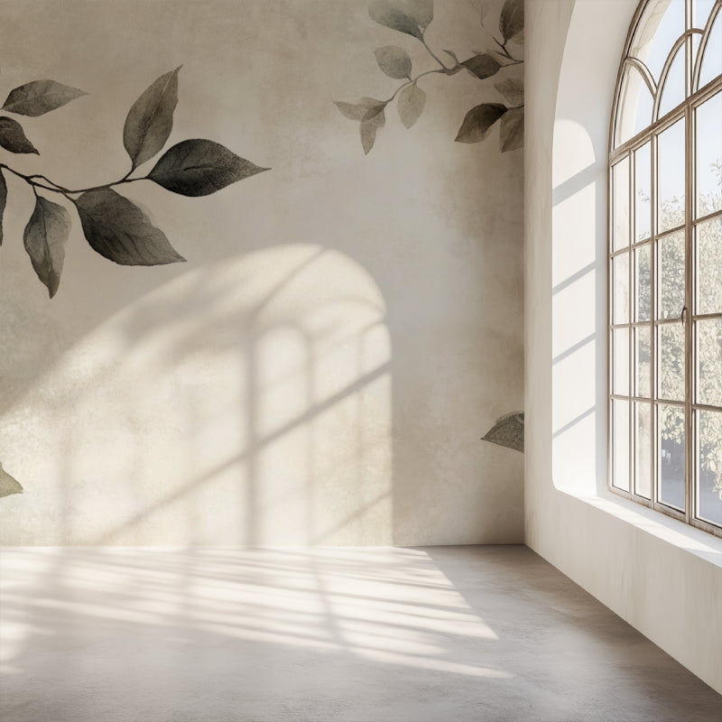 Modern black leaf wallpaper in a minimalist living room creating a peaceful atmosphere