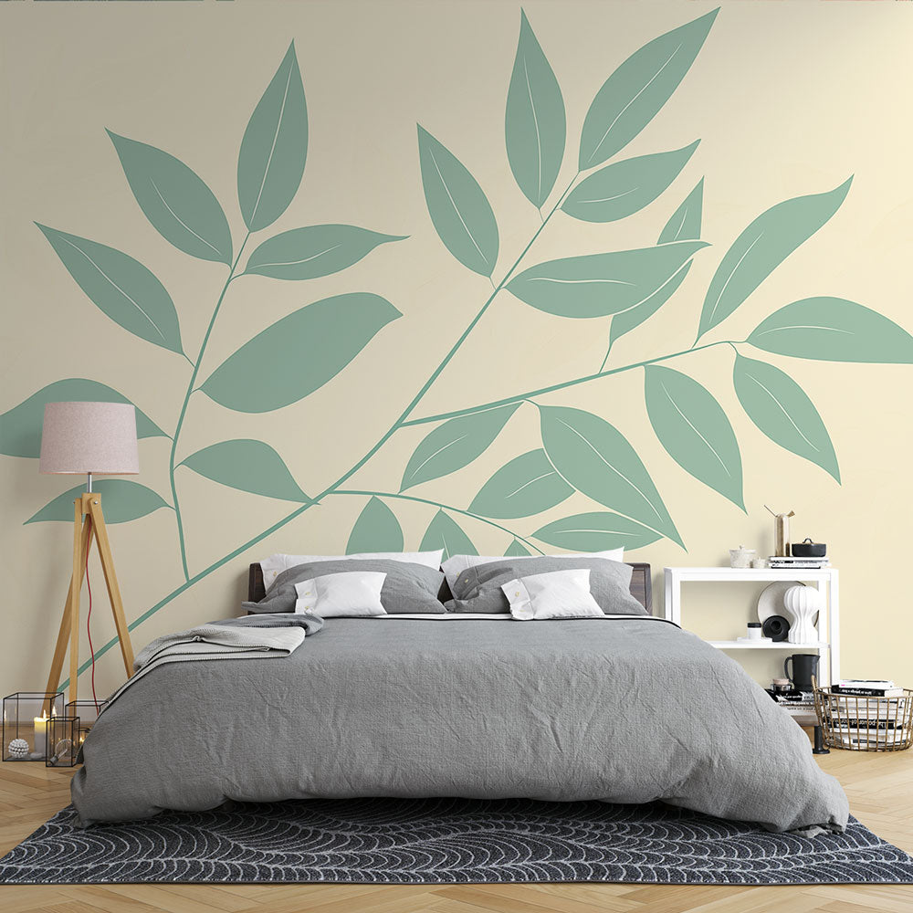 Botanical wallpaper with mint-green leaves creating a peaceful atmosphere in a modern living room setting