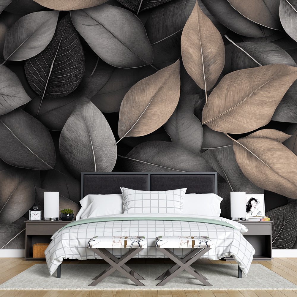 Modern black and beige leaf wallpaper in a bright living room, showing how the large-scale pattern adds depth to the space
