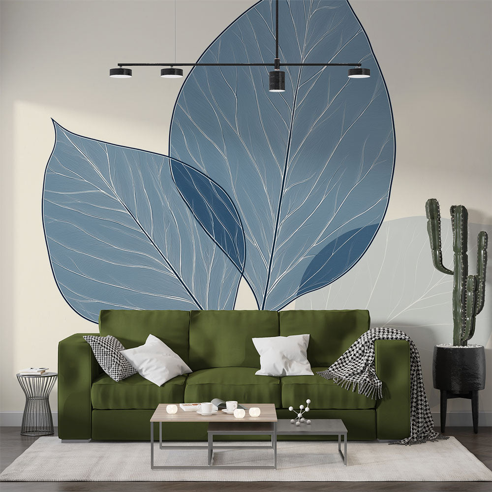 Blue leaf wallpaper in a modern living room creating a calm and airy atmosphere with natural light