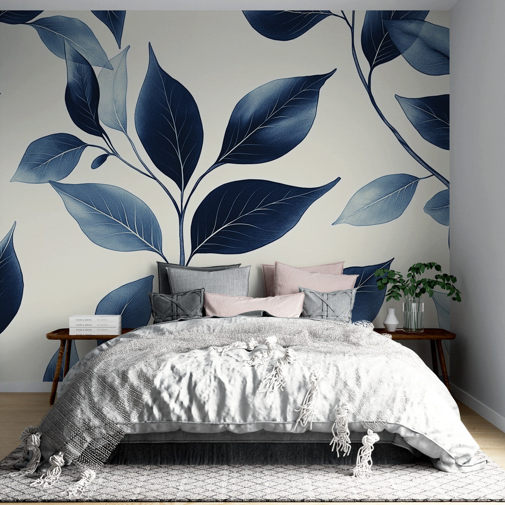 Modern blue leaf wallpaper creating a calm atmosphere in a bright living room with white sofa and natural light