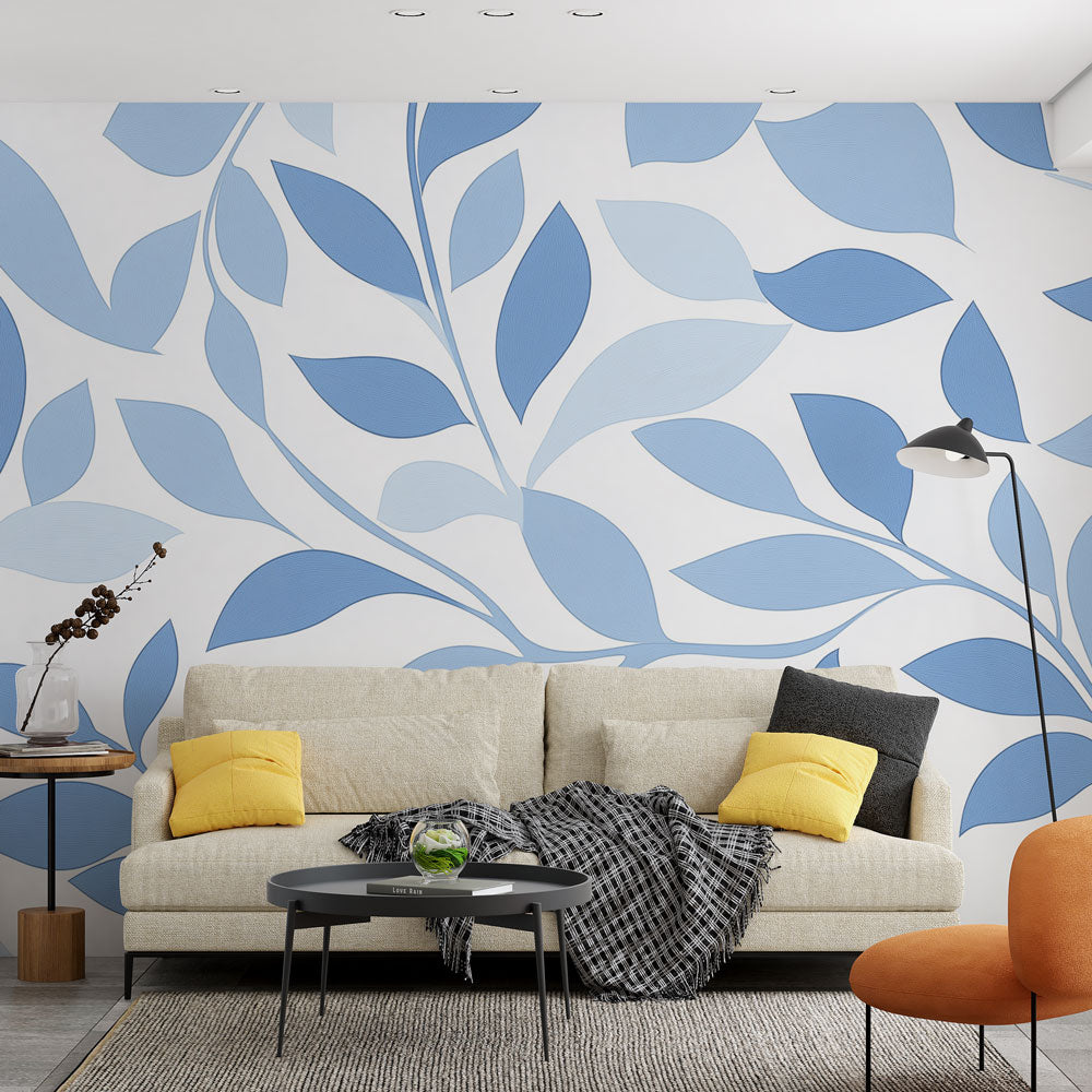 Blue leaf pattern wallpaper creating a fresh modern look in a bright living room with minimalist furniture