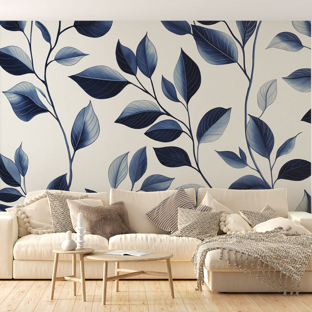 Navy blue leaf pattern mural wallpaper creating a serene atmosphere in a modern living room with natural light