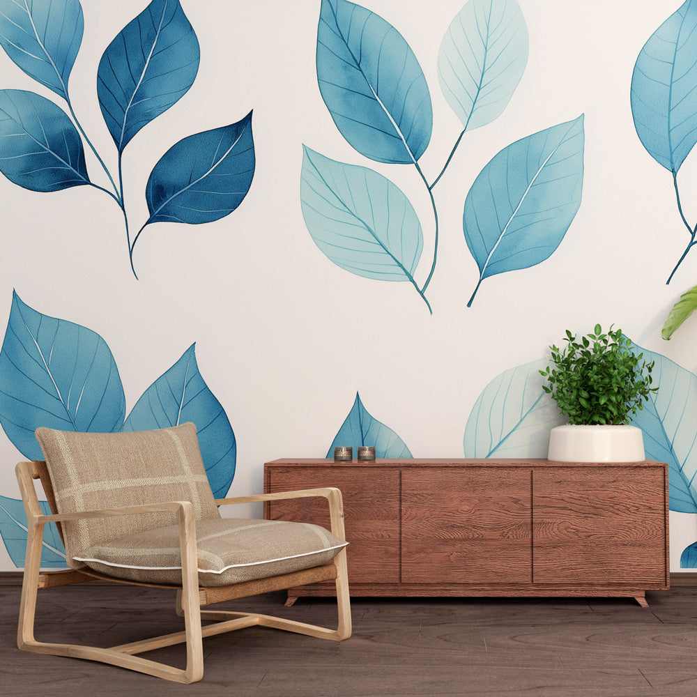 Blue watercolor leaf wallpaper creating a peaceful atmosphere in a modern living room with natural light