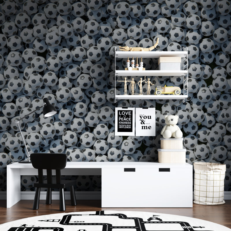 Soccer ball wall mural creating depth in minimalist living room space
